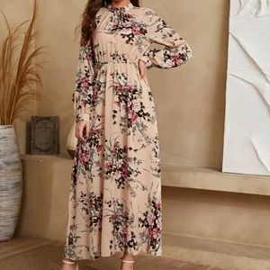 Beige dress with colorful floral patterns all over